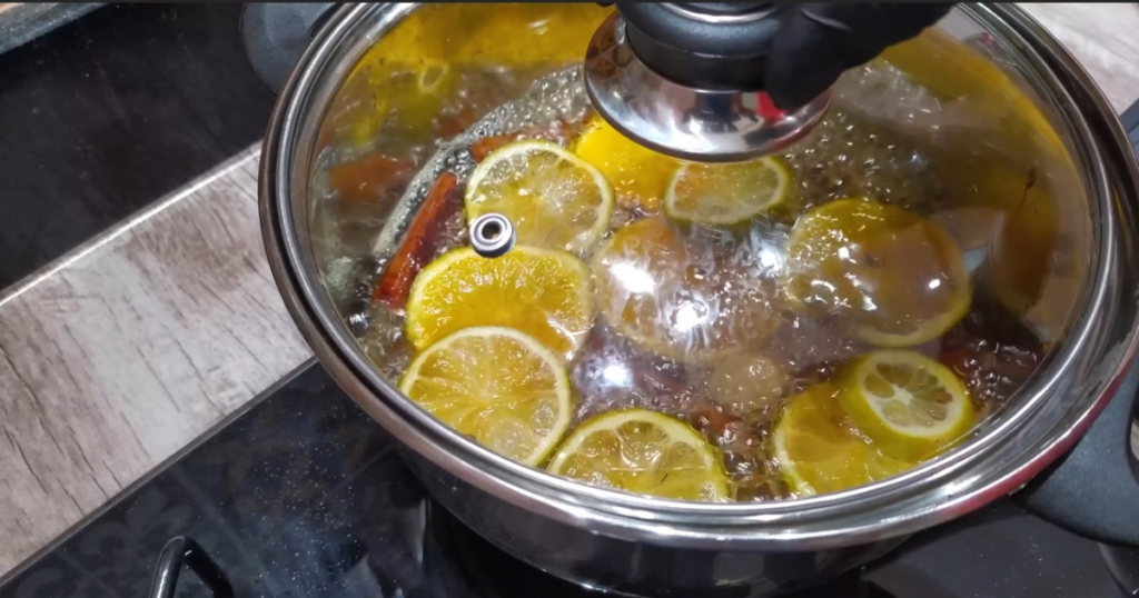 Quentao de cachaca limao laranja tampa panela