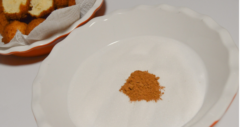 Cobertura acucar e canela